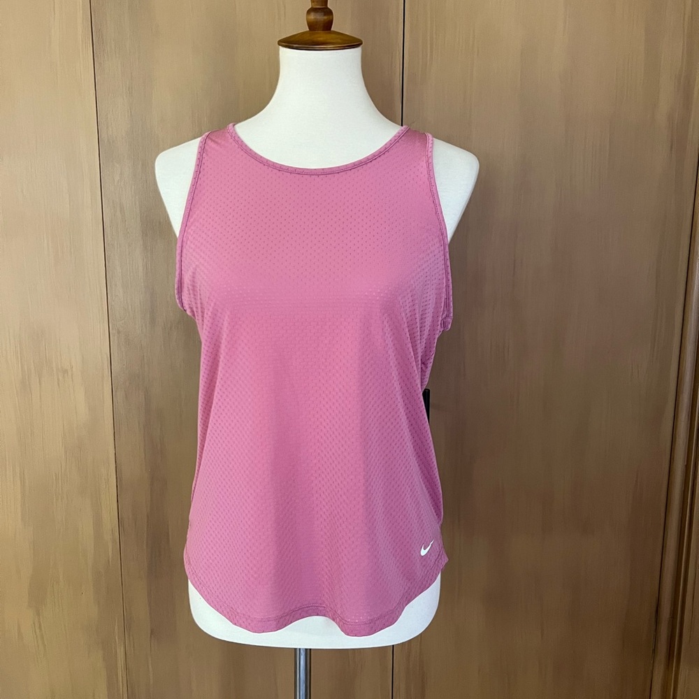 Nike Dri fit tank, misses medium. Mauve pink. Open back detail. Excellent cond